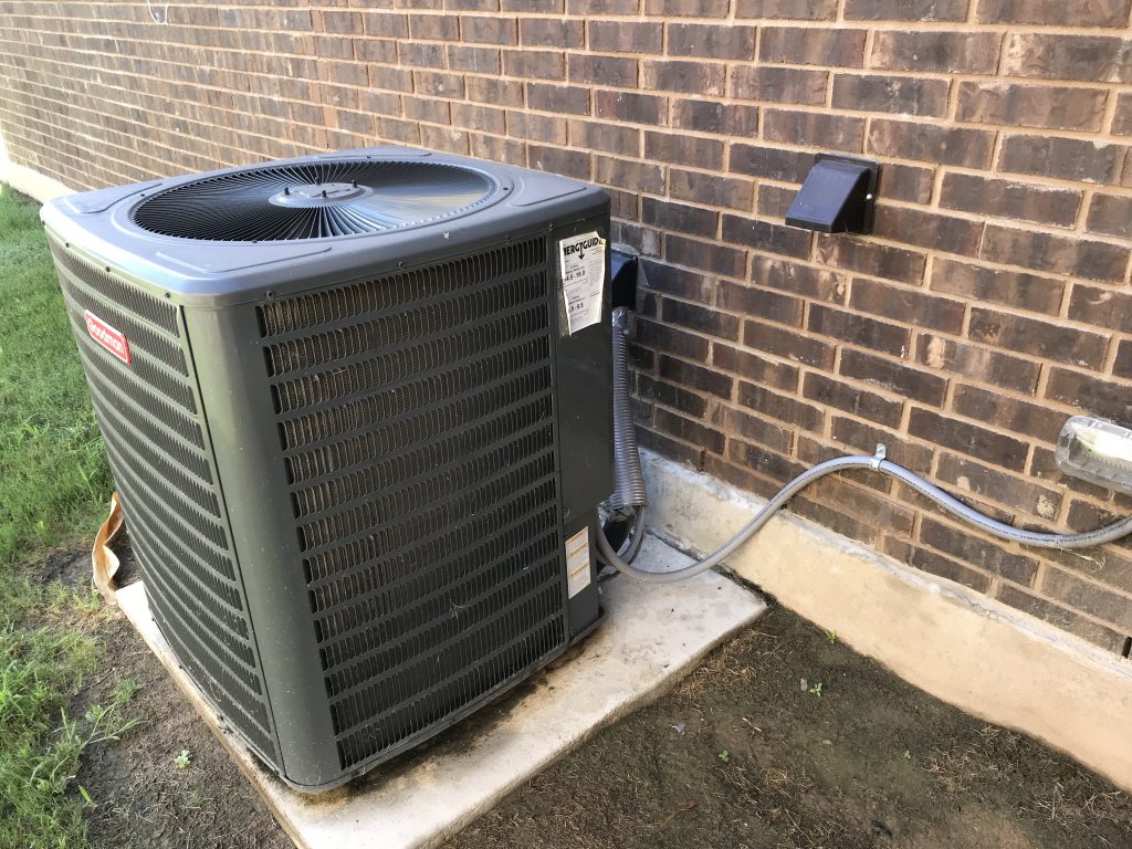 exterior condenser unit of air conditioning system